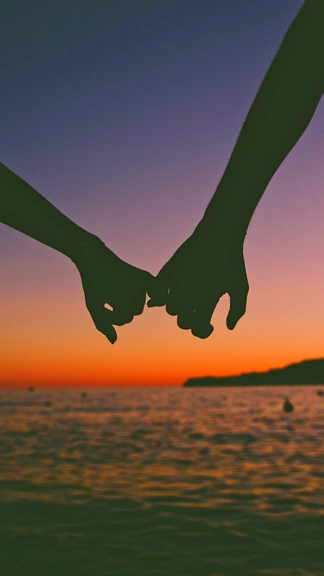 Holding Hands In The Beach Sunset